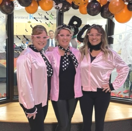 Photo of Mrs. McCorkle, Mrs Potter, and Mrs Newsom in Halloween costumes