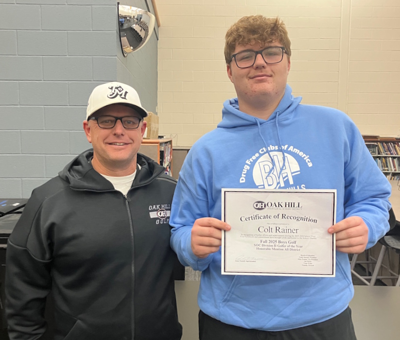 Photo of Colt Rainer and Coach Jason Wright. Colt was recognized for being SOC Division II Golfer of the Year and Honorable Mention All District