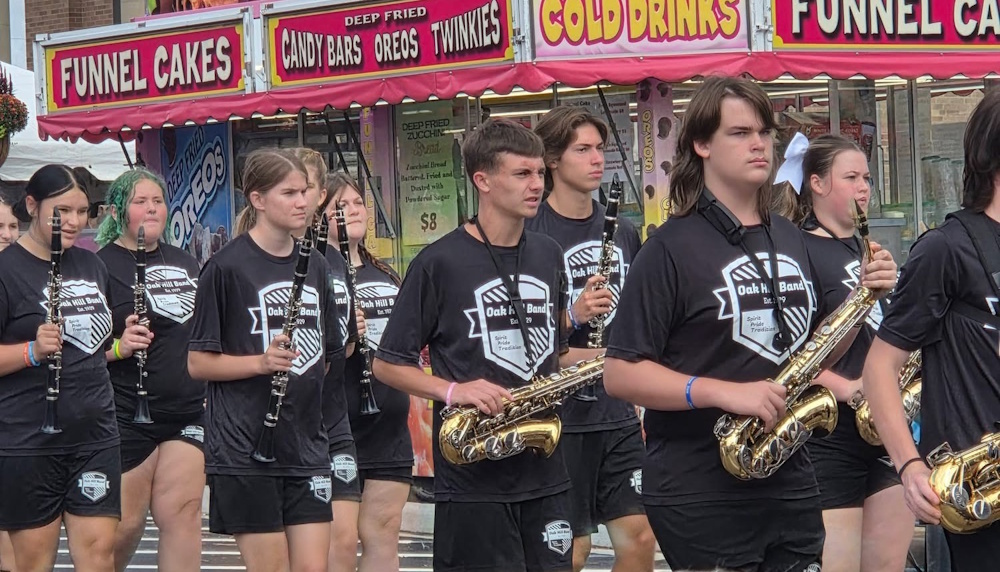 Photo of Marching Oaks band in the streets of Jackson for the Apple Festival Grand Finale Parade